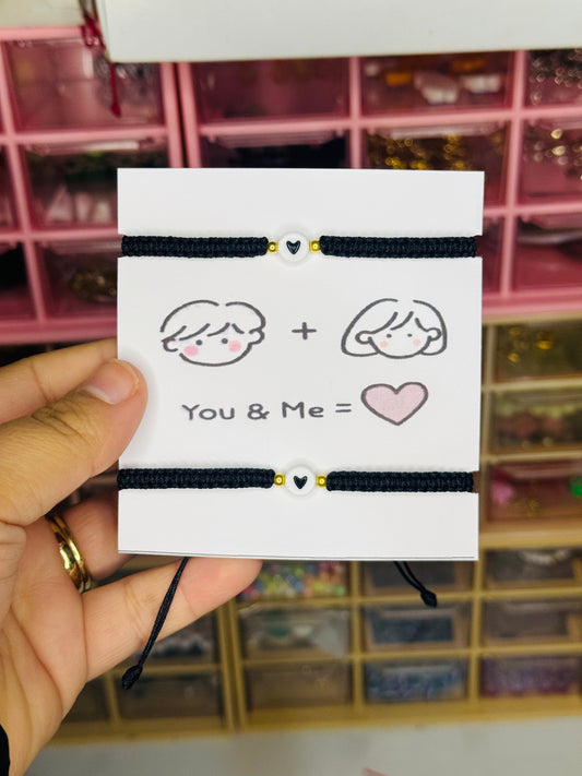 Dúo de pulseras “You & Me = ❤️”